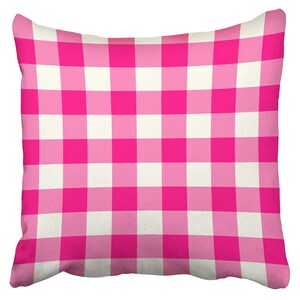 May include: Pink and white checkered throw pillow. The pillow is made of a soft, comfortable fabric and has a classic checkered pattern.