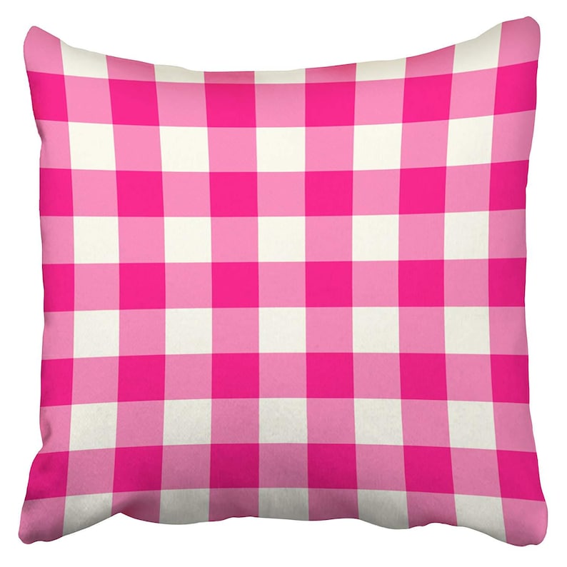 May include: Pink and white checkered throw pillow. The pillow is made of a soft, comfortable fabric and has a classic checkered pattern.