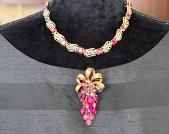 Broche vintage en perles de cristal rose, fushia et améthyste.