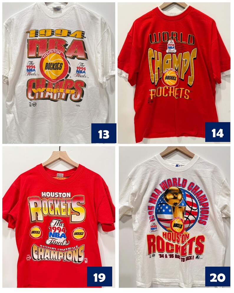 May include: Four vintage Houston Rockets t-shirts. The first two shirts are red and white, with the text "WORLD CHAMPS" and "1994 NBA Finals". The third shirt is red with the text "HOUSTON ROCKETS" and "1994 NBA Finals". The fourth shirt is white with the text "1994 NBA World Champions" and "HOUSTON ROCKETS".