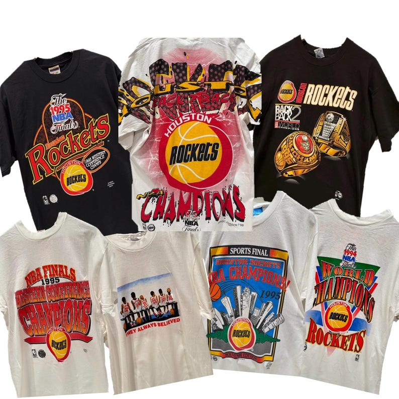 May include: Six vintage Houston Rockets t-shirts featuring various designs and logos from the 1995 NBA Finals. The shirts are white, black, and red with the team's logo and the words "Rockets" and "Champions".