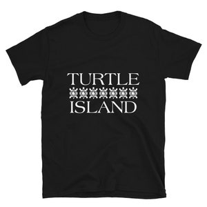 May include: Black t-shirt with white text that reads "TURTLE ISLAND" with a row of turtle silhouettes below the text.
