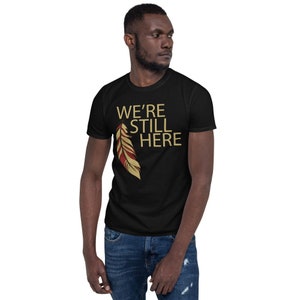 We're Still Here Feather Unisex T-shirts, Indigenous Pride, American Indian, Beige Text, Maroon, Brown image 2
