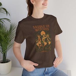 Saddle Up Witches T-Shirt | Western Cowgirl Halloween Shirt | Retro Witchy Tee | Fall Spooky Season Shirt | Witch Broom Tee
