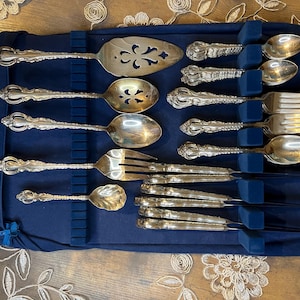 Haggerty 53 piece sterling silver flatware set, including Haggerty cloth case.