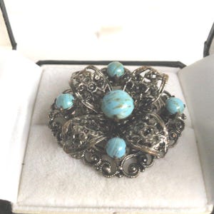 Elegant Vintage Brooch With Turquoise Coloured Stones