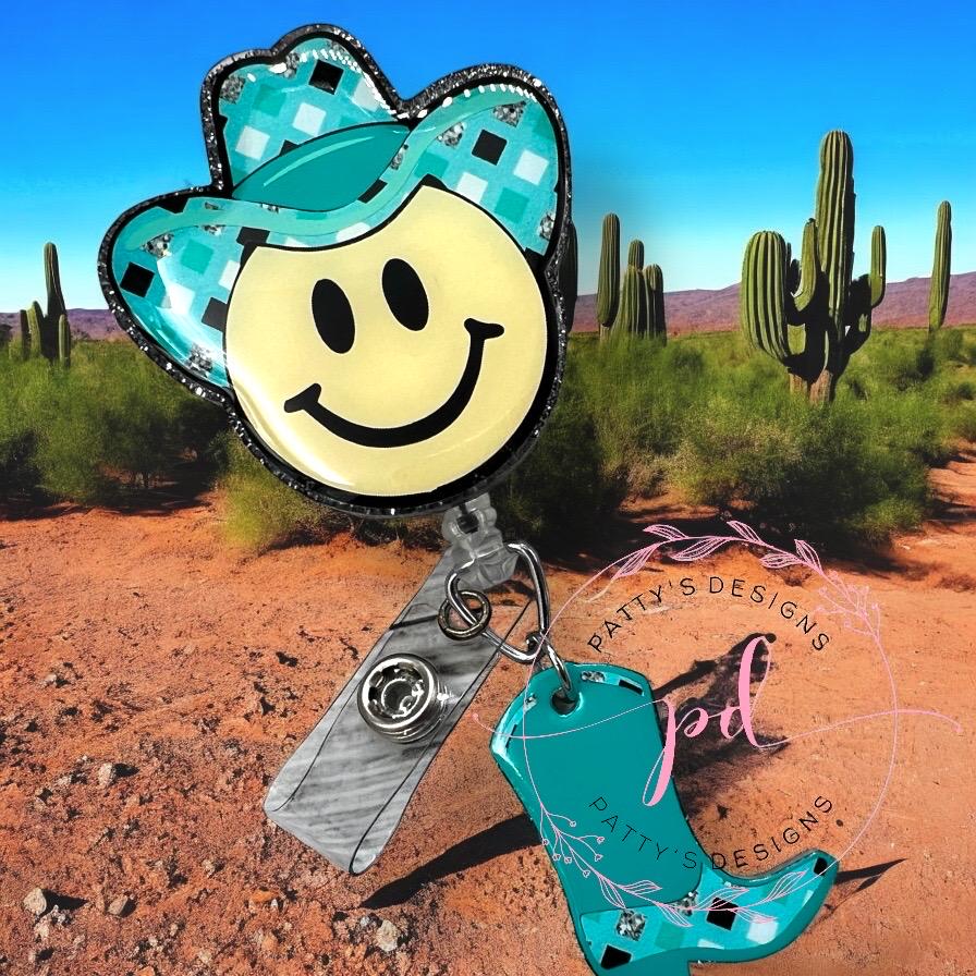 Smiley Cowboy Aqua, Happy Cowboy w/Cowboy Boot Charm Belt Clip Badge Reel