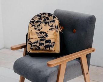 Un sillón artesanal para habitación infantil en color grafito.