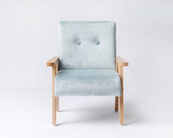 Simple wooden armchair for childrens room, fur fabric mint