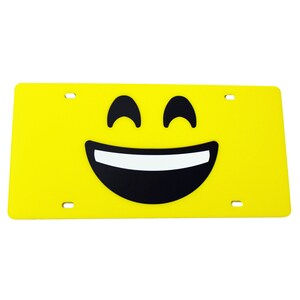 License Plate Emoji Teeth Yellow Cast Acrylic car tag.