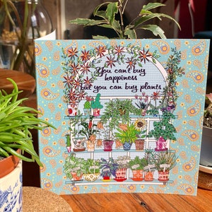 Aimant les plantes Carte avec le slogan « Vous ne pouvez pas acheter le bonheur, mais vous pouvez acheter des plantes... »