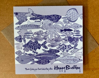 Fish birthday card with funny slogan, "That's fishy you don't look a day older. Happy Birthday"