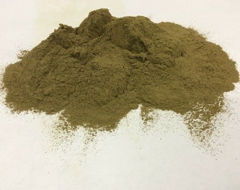 May include: A pile of dried, ground herbs in a light brown color. The herbs are finely ground and have a uniform texture.