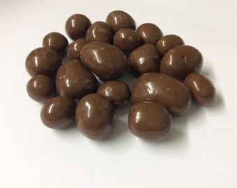 Jengibre cubierto de chocolate con leche