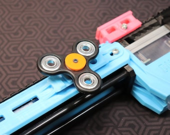 Fidget Spinner táctico montado en riel