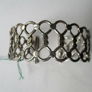 Rigid bracelet infinity symbol