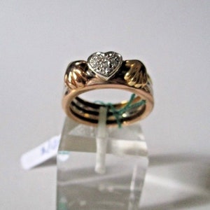 Gold ring heart in diamonds