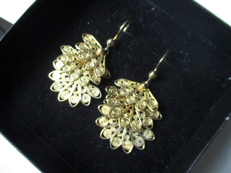 Pendant silver earrings in filigree