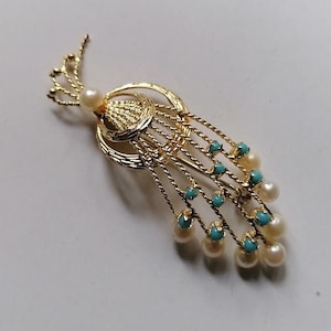 Gold brooch with turquoises and pearls