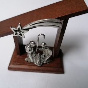 Christmas Nativity in wood and silver 7cm