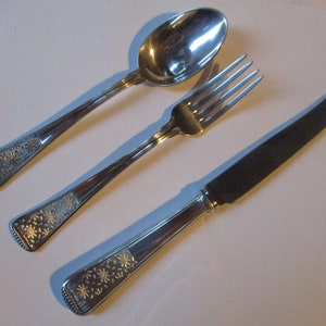 Tris of cutlery in silver 800