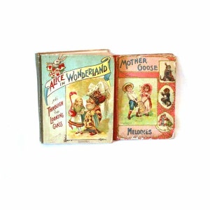 An Antique 1800 's circa  Alice in Wonderland book by McLoughlin Bros. 1800 Also included Mother  Goose  Melodies by Graham & Mattack N. Y.