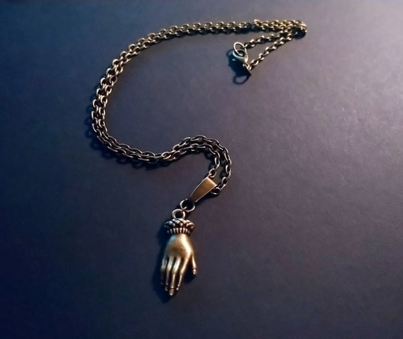 Hand palm hotsell necklace