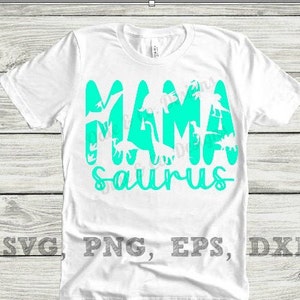 May include: White t-shirt with a turquoise graphic that says "Mama Saurus" with dinosaur silhouettes.