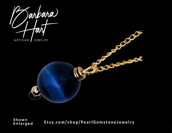 Blue tigers sales eye necklace