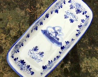 Lovely China trinket dish in blue and white design and stamped to base in very good condition