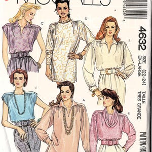 May include: A sewing pattern for five different tops. The pattern is for sizes 22-24, extra large. The tops are all different styles, including a collared top, a cowl neck top, and a top with a gathered neckline. The pattern is from McCall's and is called "Easy McCall's".