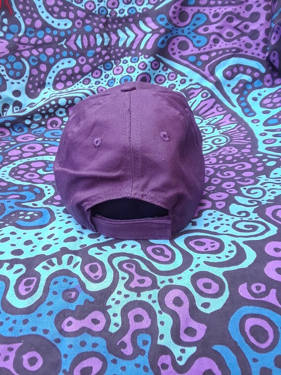dark purple baseball cap