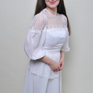 white peplum dress with black lace White Nomad Lace Dress With Sculpted Peplum