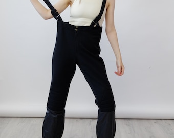 Pantalones de esquí de lana elástica negra de los años 80 con tirantes y polaina de nailon, estilo vintage, talla L.