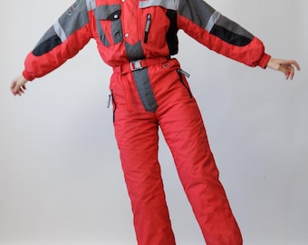 Traje de esquí vintage de los 90 Brugi rojo carbón con bloques de color, mono reflectante de una pieza, talla S