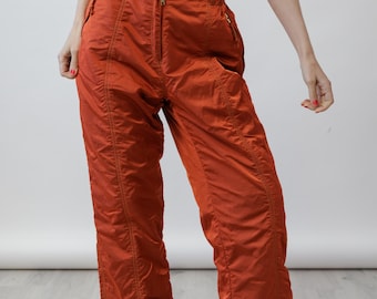Pantalones de esquí vintage iridiscentes color naranja quemado de los años 90, fabricados en Italia, cintura alta, talla L.