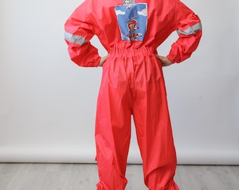 Mono de esquí Uvex rojo vintage de los 90, impermeable, con estampado de dibujos animados en la espalda, talla M.