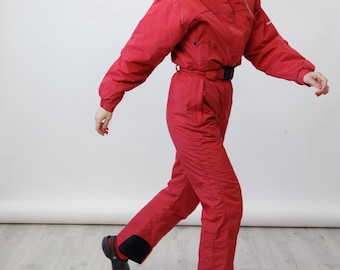 Traje de esquí vintage de una pieza con cinturón rojo cereza estilo Y2K y capucha oculta, talla S.