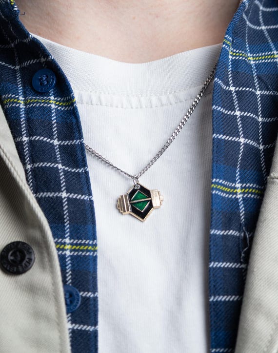 Dumbbell charm necklace  reworked vintage pin green enamel on black cord