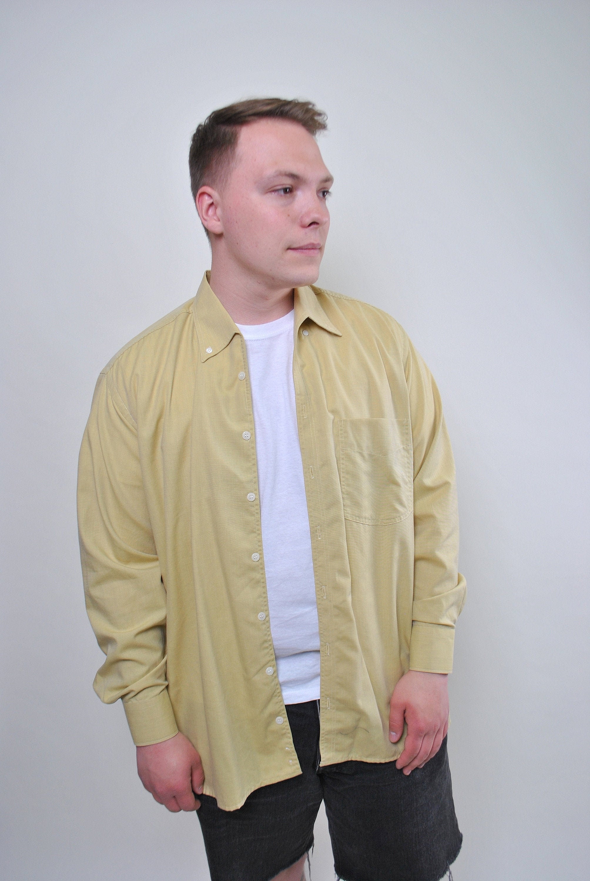 yellow button down long sleeve shirt