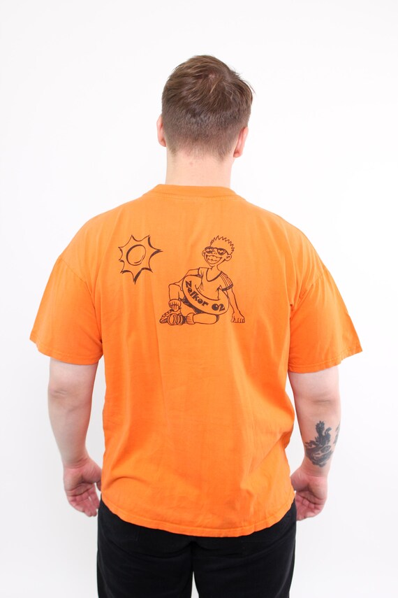 90s oversized funky print t-shirt, vintage crew neck tee in orange Size L