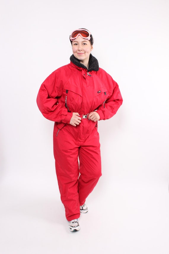 Combinaison de ski rouge sale