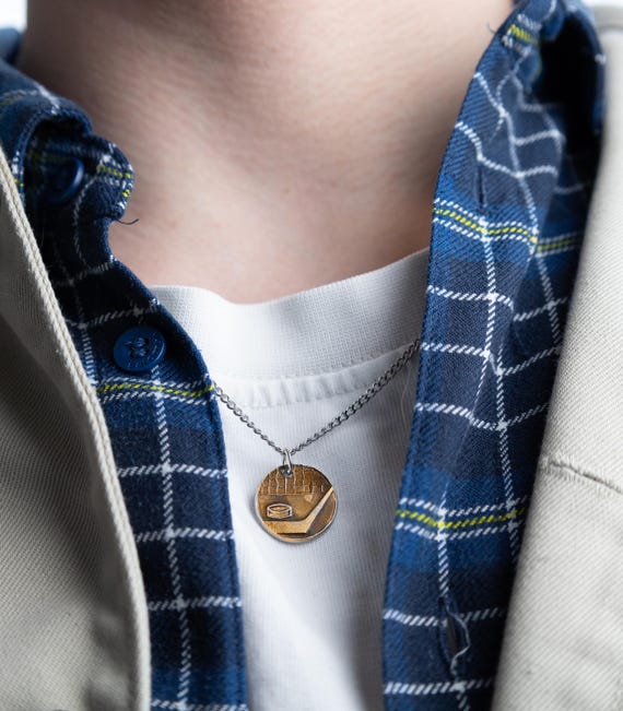 Hockey puck and stick necklace reworked vintage 60s pin gold coin upcycled jewelry