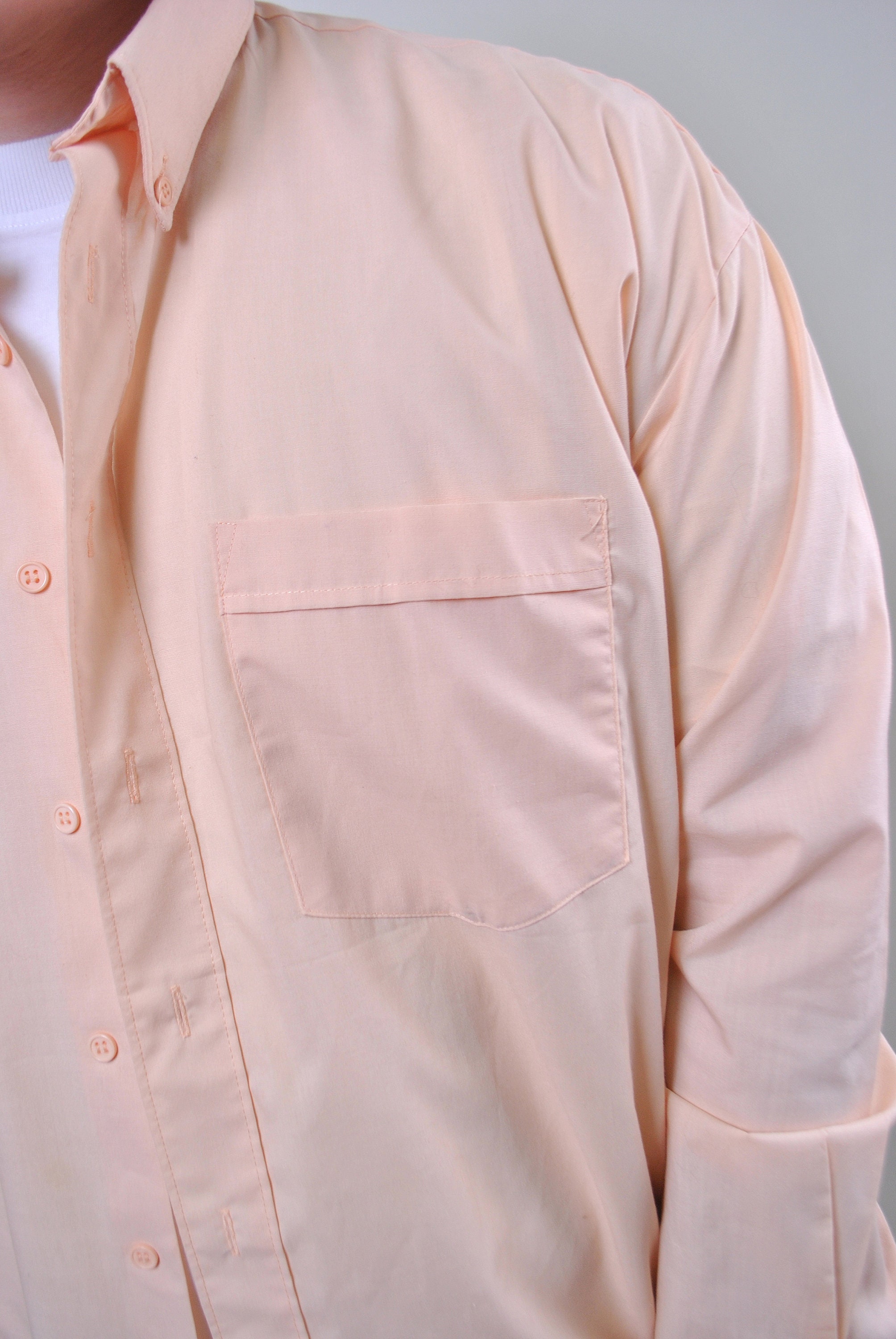 light pink shirt with tie