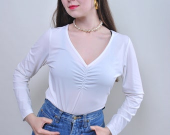 90-tals v-ringad pulloverblus i vitt, transparent vintageblus, storlek L