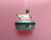 Hand painted Limoges porcelain trinket box by Castel in the shape of a mallard duck
