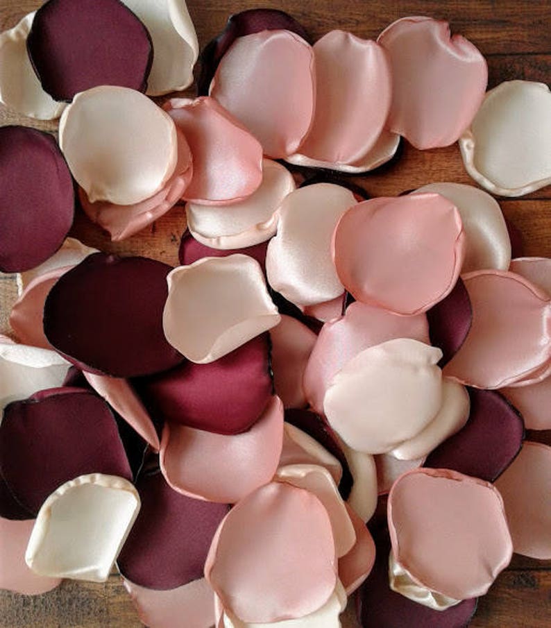 BUrgundy, rose gold, and champagne rose petals for wedding decor