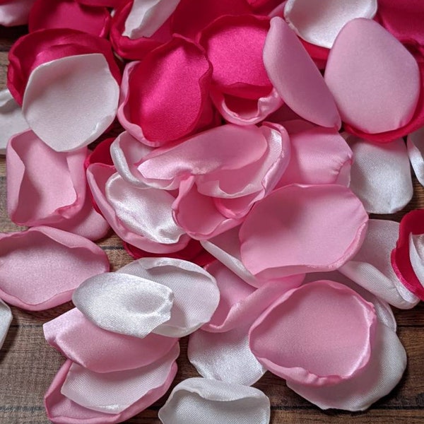 Fuschia flower petals for wedding-flower decorations ideas for cake-centerpieces-reception decor-hot pink party-bridal shower decorations