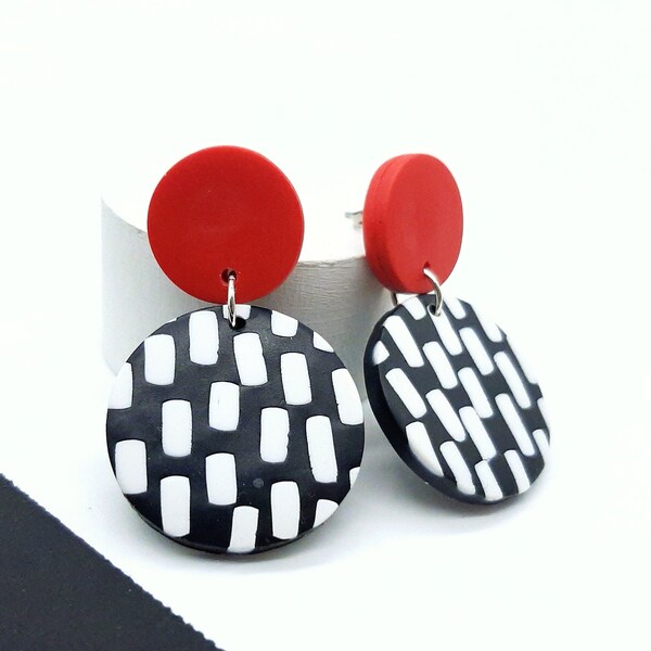 red earrings, black and white polka dots