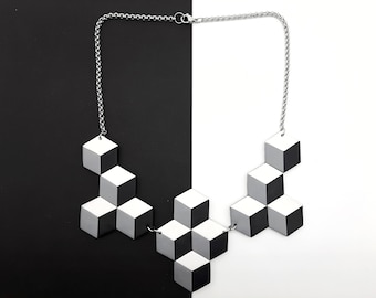 Black and white geometric necklace with optical illusion 3d cubes